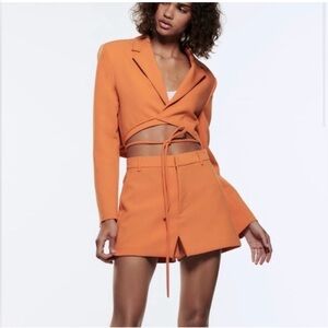 NWT.  Orange Cropped Blazer and Mini Skirt/Skort Set.